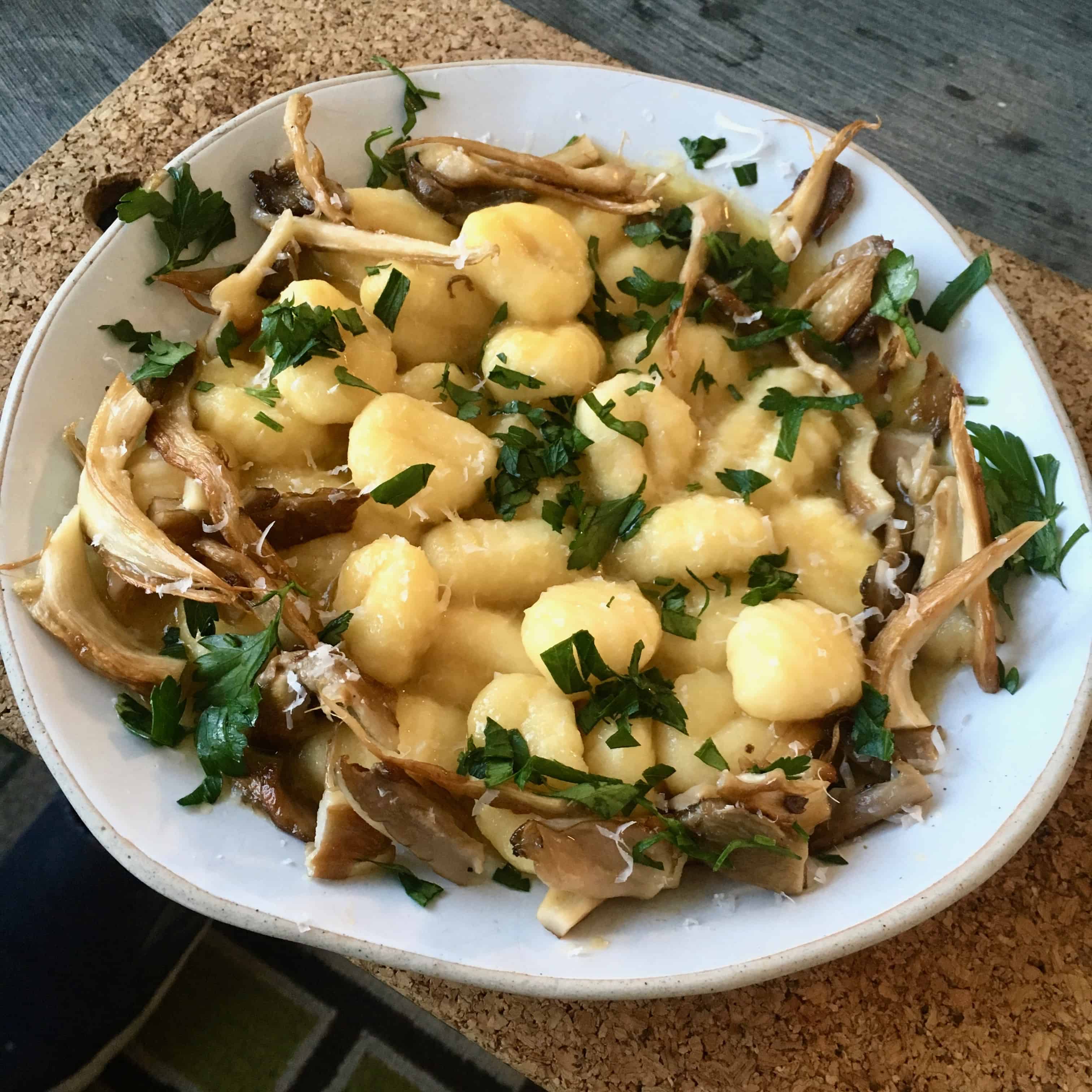 Gnocchi with White truffle Butter and Wild Mushrooms