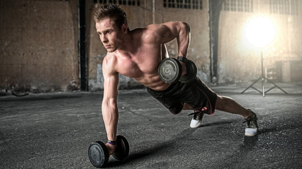 free weight exercises with dumbbells 1024x576 - I Tried Ryan Reynolds’ Insane ‘Deadpool 2’ Workout—and Now I Know Why He’s Shredded