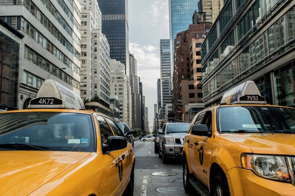 taxi cab in USA 1024x680 - Living In The City Vs. Living In The Suburbs: Pros And Cons