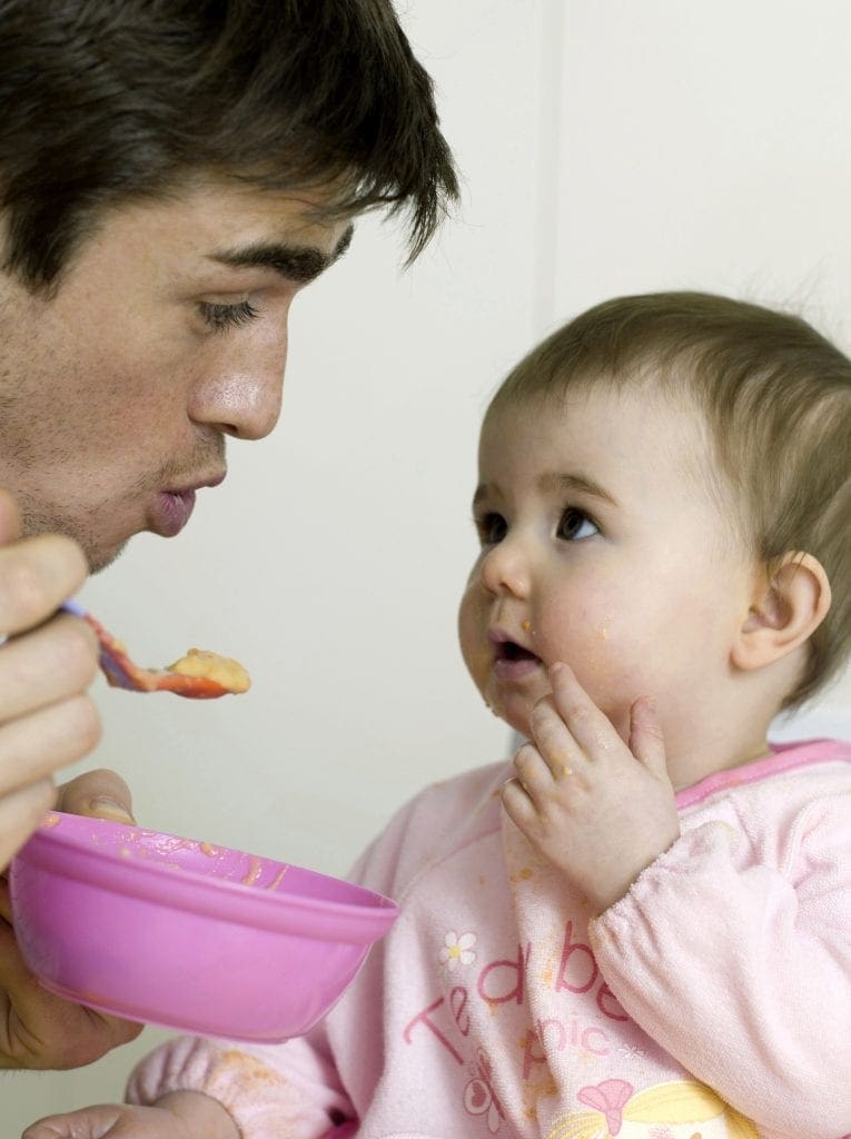 daddy feeding 765x1024 - Become The Best Chef Dad For Your Baby Using a Baby Food Maker