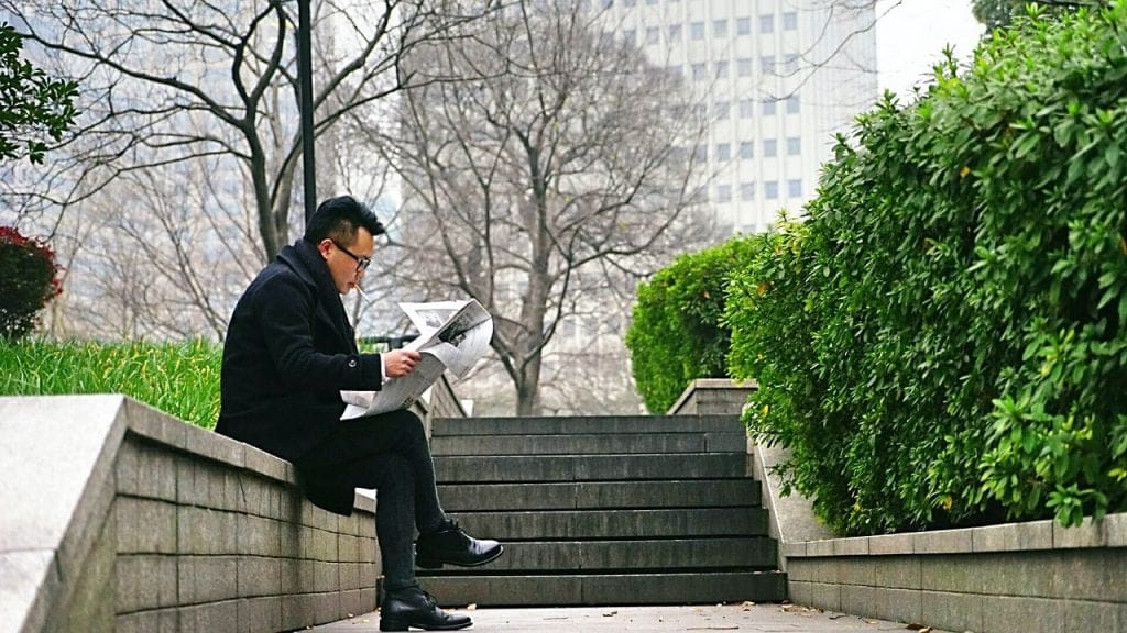 men-reading newspaper