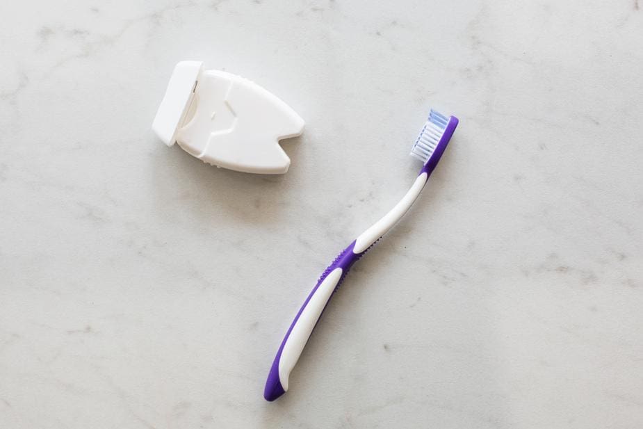toothbrush floss - 5 Common Oral Hygiene Mistakes You Should Take Care of