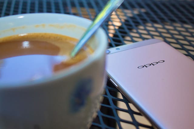 Oppo with cup of coffee
