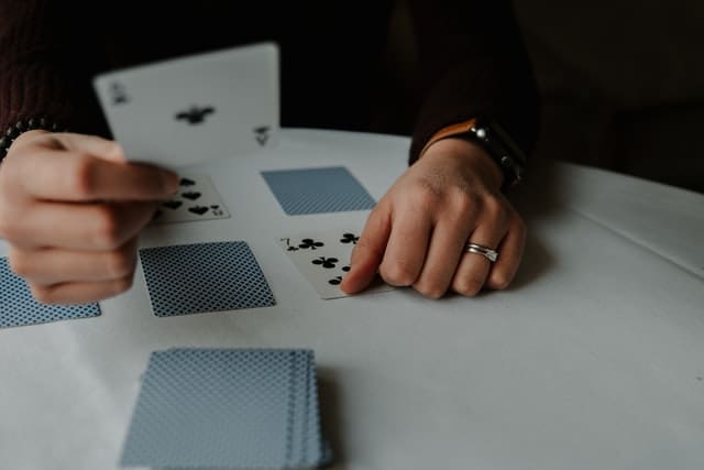 andrik langfield S0 Ep9meLFY unsplash - What Are The Basic Rules of Euchre?