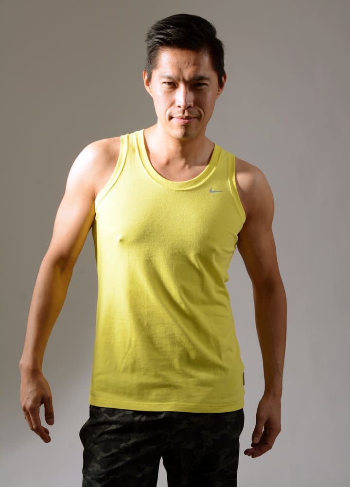 Man in yellow tank top for shapewear